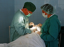 Dental patient receiving oral surgery