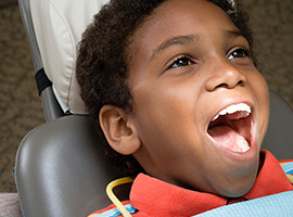 Little boy in dental chair for children's dentistry
